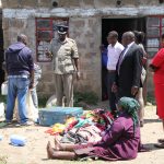 The 99-year-old woman (seated) was found in possession of crude weapons at her home in Majengo informal settlement during a raid on Thursday, June 8, 2023.
