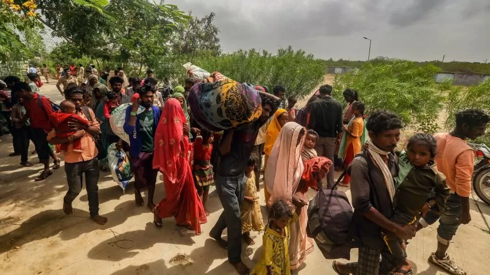 More than 100,000 people in India and Pakistan have been evacuated from the path of a fierce cyclone