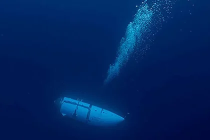 US Navy says search team detected implosion sounds after sub lost contact