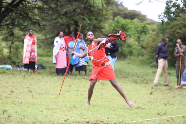 A Maasai moran prepares to throw a Javelin during a competition to mark Earth Hour at the Mara Siana Conservancy on Saturday, 25 March 2023. PHOTO | WWF-KENYA | CAMTECH COMMUNICATIONS