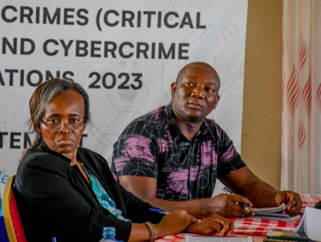 (L-R) Wanjiku Mbiyu, member of the National Computer and Cybercrimes Coordination Committee (NC4) and Co-Chair of the task force for the development of CMAC regulations Col. Evans Ombati keenly follow public views on the regulations in Mombasa.