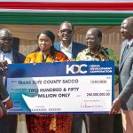President William Ruto handing over the KSh 250 million cheque from the Kenya Development Corporation (KDC) to Trans Elite County SACCO in Kapsabet, Nandi County.