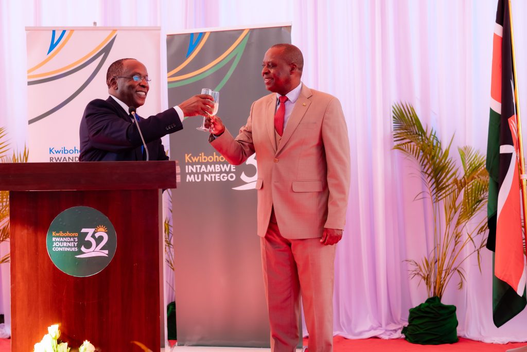 R-L: Rwandan Ambassador to Kenya Ernest Rwamucyo and Kenya's Foreign Service Academy’s Director General Ambassador Patrick Wamoto clicking their glasses.