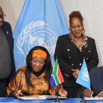 UN Resident Coordinator in South Africa Nelson Muffuh (R, front) and South African Minister in the Presidency for Planning, Monitoring and Evaluation Maropene Ramokgopa (L, front) sign the UN Sustainable Development Cooperation Framework in Pretoria, South Africa, July 10, 2026.  (GCIS/Handout via Xinhua)